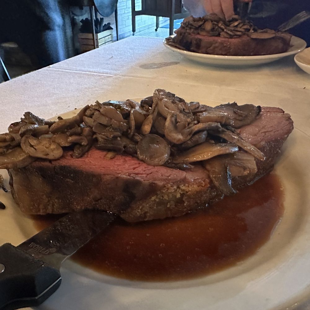 Marek's Harbor Grill - 20 oz. Prime Rib w/ mushrooms - Steakhouses Near Me - Charlevoix, Michigan Marek's Harbor Grill - 20 oz. Prime Rib w/ mushrooms - Steakhouses Near Me - Charlevoix, Michigan