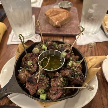 Saltgrass Steak House - Tenderloin bites. Those 7 bites very tasty. Underneath swimming in oil, onion, and mushroom mixture. - Steakhouses Near Me - San Antonio, Texas