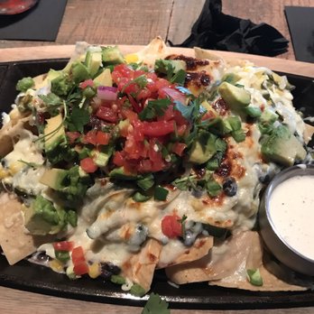 Saint Anejo - Skillet Nachos with Rajas added - Cocktail Bars Near Me - Nashville, Tennessee Saint Anejo - Skillet Nachos with Rajas added - Cocktail Bars Near Me - Nashville, Tennessee