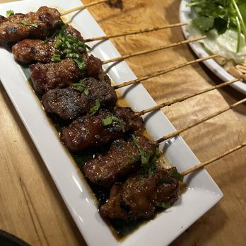 Lao Lao Bar - BBQ pork skewers - moo ping - Laotian Near Me - Toronto, Ontario