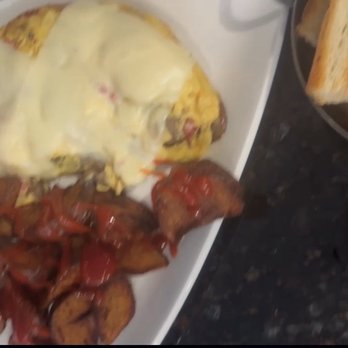 North Street Grille - The Steak Bomb Omelet with mushrooms, red & green peppers, home fries, toast And yes, that's ketchup on my home fries.I like what I like - Breakfast & Brunch Near Me - Boston, Massachusetts North Street Grille - The Steak Bomb Omelet with mushrooms, red & green peppers, home fries, toast And yes, that's ketchup on my home fries.I like what I like - Breakfast & Brunch Near Me - Boston, Massachusetts