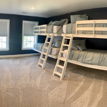 Carpets And More - a room with bunk beds - Flooring Near Me - Kennett Square, Pennsylvania