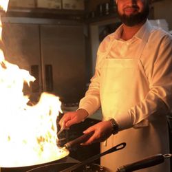 Manager Hakim cooking it up for a VIP guest