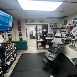 Cryptic Tattoo Company - Sam's booth where the magic happens