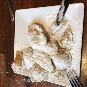 De Vier Pilaren - Poffertjes with powdered sugar and butter. Small order (10) - Creperies Near Me - Amsterdam, New Hampshire De Vier Pilaren - Poffertjes with powdered sugar and butter. Small order (10) - Creperies Near Me - Amsterdam, New Hampshire