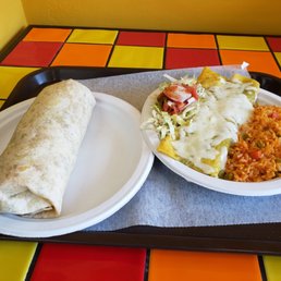 Burrito with rice and black beans, pork carnitas. Beef enchiladas, rice and salad.