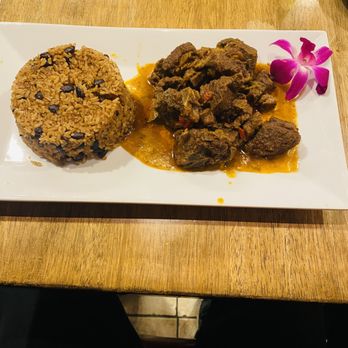 Merengue Restaurant - two plates of food on a table - Dominican Near Me - Stamford, Connecticut Merengue Restaurant - two plates of food on a table - Dominican Near Me - Stamford, Connecticut
