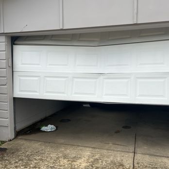 My Choice Garage - Dented garage door (before MCG) - Garage Door Services Near Me My Choice Garage - Dented garage door (before MCG) - Garage Door Services Near Me