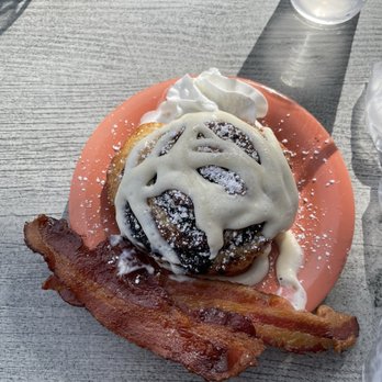 The Hatch - Cinnamon roll with cream cheese frosting and a side of bacon - Breakfast & Brunch Near Me - Osage Beach, Missouri