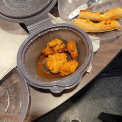 Pizza Hut - Pizza and baby chicken pieces that I wouldn't even call a Nugget. Maybe a silver dollar size being generous.