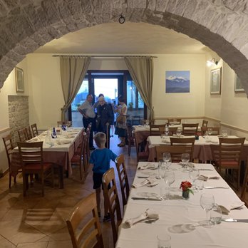 Olmicello - The main section of the restaurant, with a balcony that leads to seven other tables. - Italian Near Me - Oratino, CB