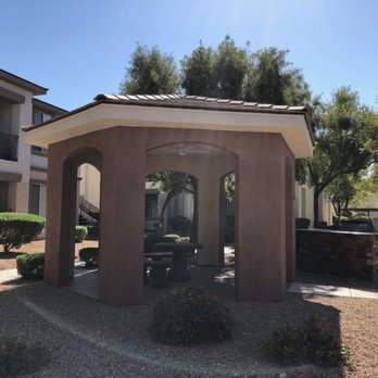 Acerno Villas - BBQ area: Nice sized gas range BBQ to use with spot to hang out and chill. There's also a putting green right next to it. - Apartments Near Me - Las Vegas, Nevada