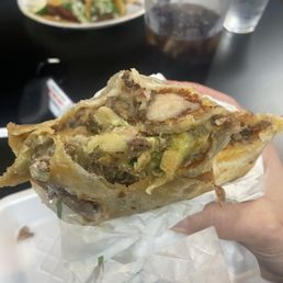 Cali burrito with birria, amazing. Cali burrito with birria, amazing.