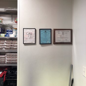 Chevron - a wall with three plaques on it - Gas Stations Near Me - Heflin, Alabama
