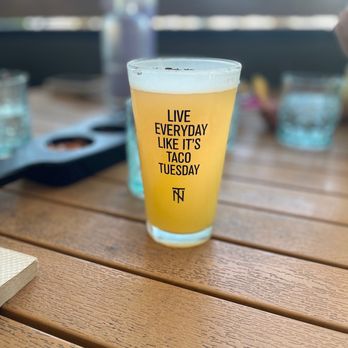Nixtaco - a glass of beer on a table - Mexican Near Me - Roseville, California Nixtaco - a glass of beer on a table - Mexican Near Me - Roseville, California