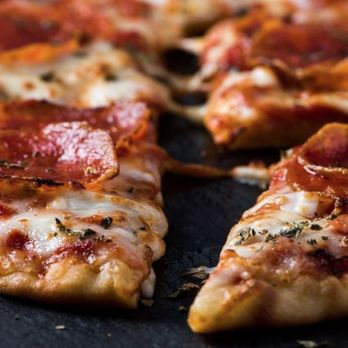 Topgolf - a slice of pepperoni pizza - Golf Near Me - Fishers, Indiana Topgolf - a slice of pepperoni pizza - Golf Near Me - Fishers, Indiana