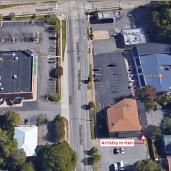 Artistry in Hair - Salon's entrance and parking is on the other side of the Income Tax building. GPS usually sends you to Mom & Pops parking lot