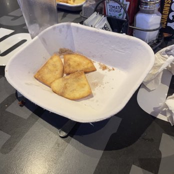 Buffalo Wild Wings - This is the "ice cream" they brought out for my daughter's birthday. The server was sure there was ice cream in the chips... - Sports Bars Near Me - Morris, Illinois