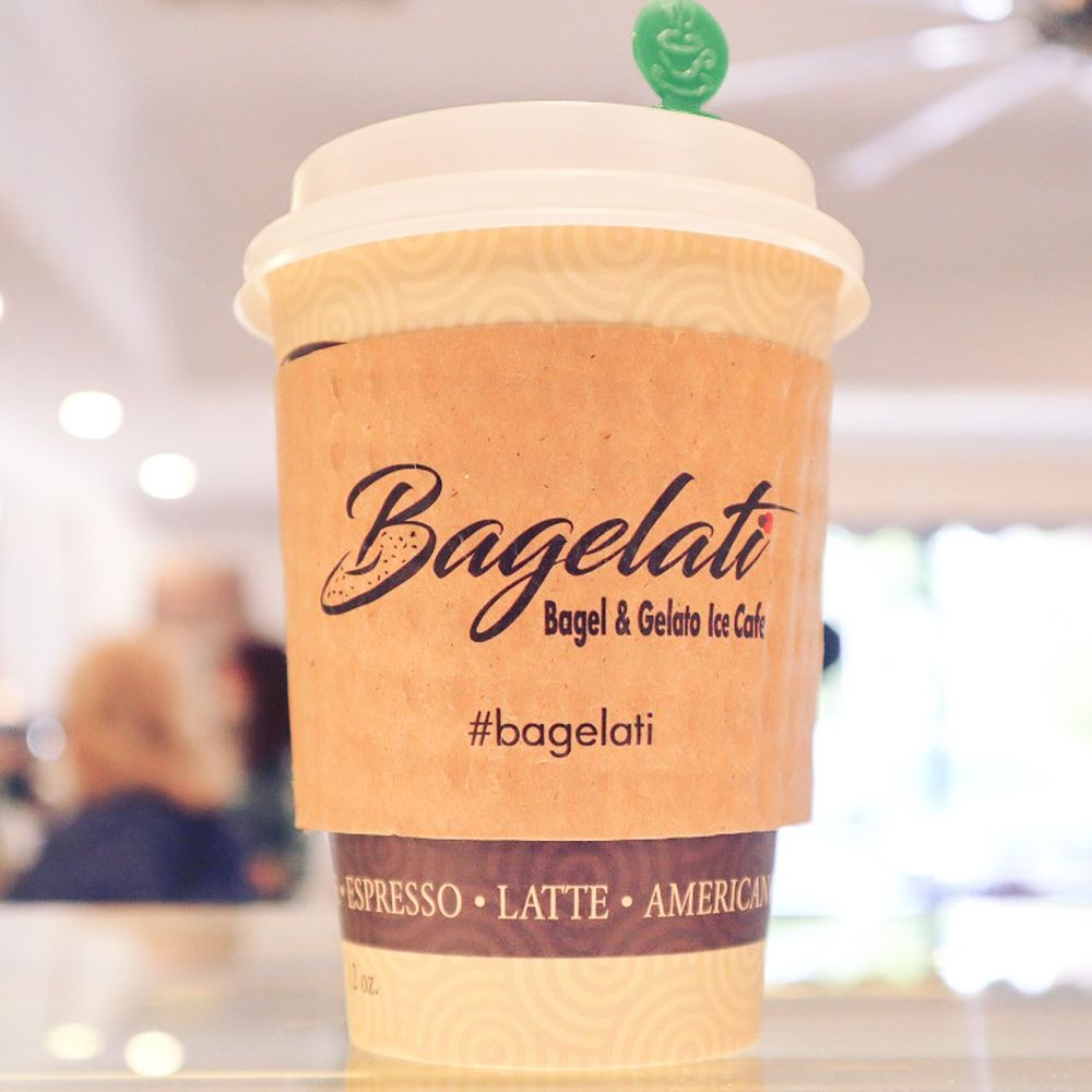 Bagelati - a cup of coffee on a table - Bagels Near Me - Marlton, New Jersey