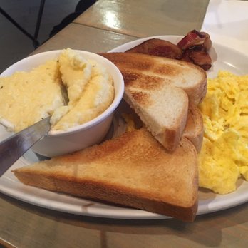 Two Chicks Cafe - Eggs bacon and grits with toast - Breakfast & Brunch Near Me - New Orleans, Louisiana Two Chicks Cafe - Eggs bacon and grits with toast - Breakfast & Brunch Near Me - New Orleans, Louisiana