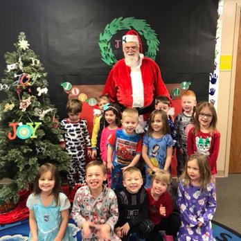 Joyful Mission Preschool - Once again the kids wore their PJ's and Santa came for a visit - Preschools Near Me - Parker, Colorado