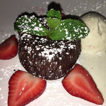 DishDash - Cho-Kolata: warm chocolate lava cake w/ vanilla bean ice cream and strawberries - Middle Eastern Near Me - Sunnyvale, California
