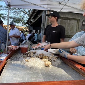 The Raw Bar Yoho - a group of people at a food stand - Seafood Markets Near Me - Nantucket, Massachusetts The Raw Bar Yoho - a group of people at a food stand - Seafood Markets Near Me - Nantucket, Massachusetts