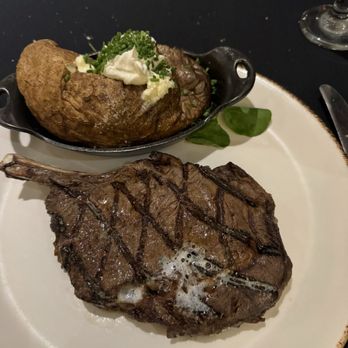 Silverado Steak House - Bone Bone-In Rib-Eye with Baked Potato - Steakhouses Near Me - Las Vegas, Nevada