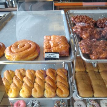 Howard's Donuts - Cinnamon roll donut and apple bear claw. Huge apple fritters - Donuts Near Me - Gold River, California Howard's Donuts - Cinnamon roll donut and apple bear claw. Huge apple fritters - Donuts Near Me - Gold River, California