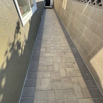 Revive Exteriors - Paver border completed all around the house and final Polymeric sand and final compaction has been completed. Courtyard pavers - Windows Installation Near Me - Torrance, California