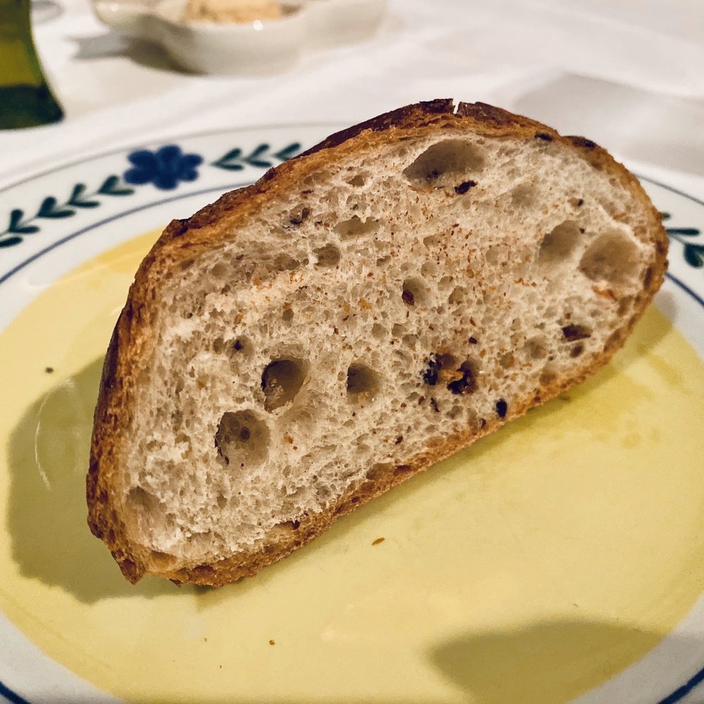 Kellari Taverna - Olive bread - Greek Near Me - New York, New York Kellari Taverna - Olive bread - Greek Near Me - New York, New York