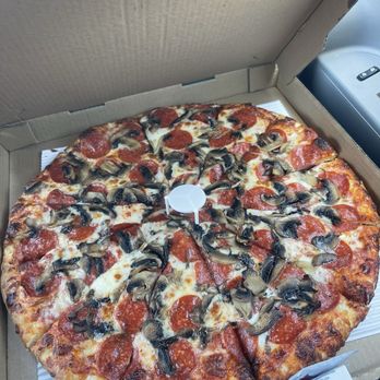 Pizza Grande - The cheese pull though delicious pizza pepperoni, and mushroom yummy - Pizza Near Me - Stanton, California