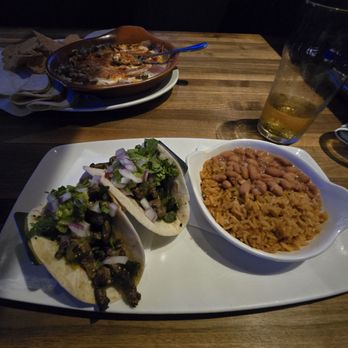 Yard House - Carne Asada Tacos with rice and beans - New American Near Me - Mclean, Virginia Yard House - Carne Asada Tacos with rice and beans - New American Near Me - Mclean, Virginia