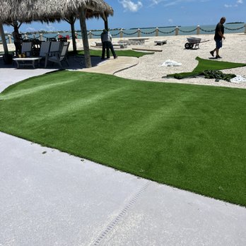 Unlimited Scapes - a woman walking on the beach - Landscaping Near Me - Key West, Florida Unlimited Scapes - a woman walking on the beach - Landscaping Near Me - Key West, Florida