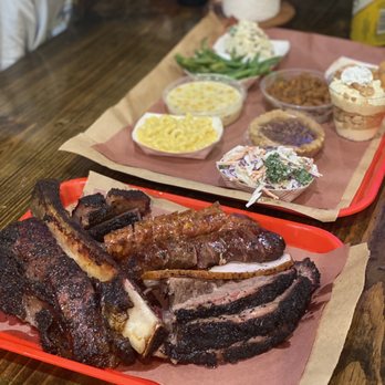 Terry Black's Barbecue - Beef rib, sausage, brisket, smoked turkey, Mac & cheese, coleslaw, beans, corn, green beans, potato salad, pecan pie, banana pudding. - Barbeque Near Me - Austin, Texas