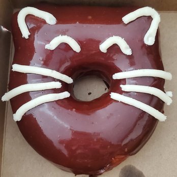 Darkside Donuts - a chocolate donut with white icing in a box - Donuts Near Me - Saskatoon, Saskatchewan Darkside Donuts - a chocolate donut with white icing in a box - Donuts Near Me - Saskatoon, Saskatchewan