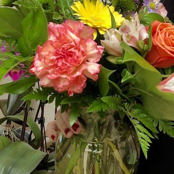 Crescenta Valley Flowers - A happy friend holding a bouquet  of love on Valentine's Day thanks to Crescenta Valley Flowers! - Florists Near Me - La Crescenta, California