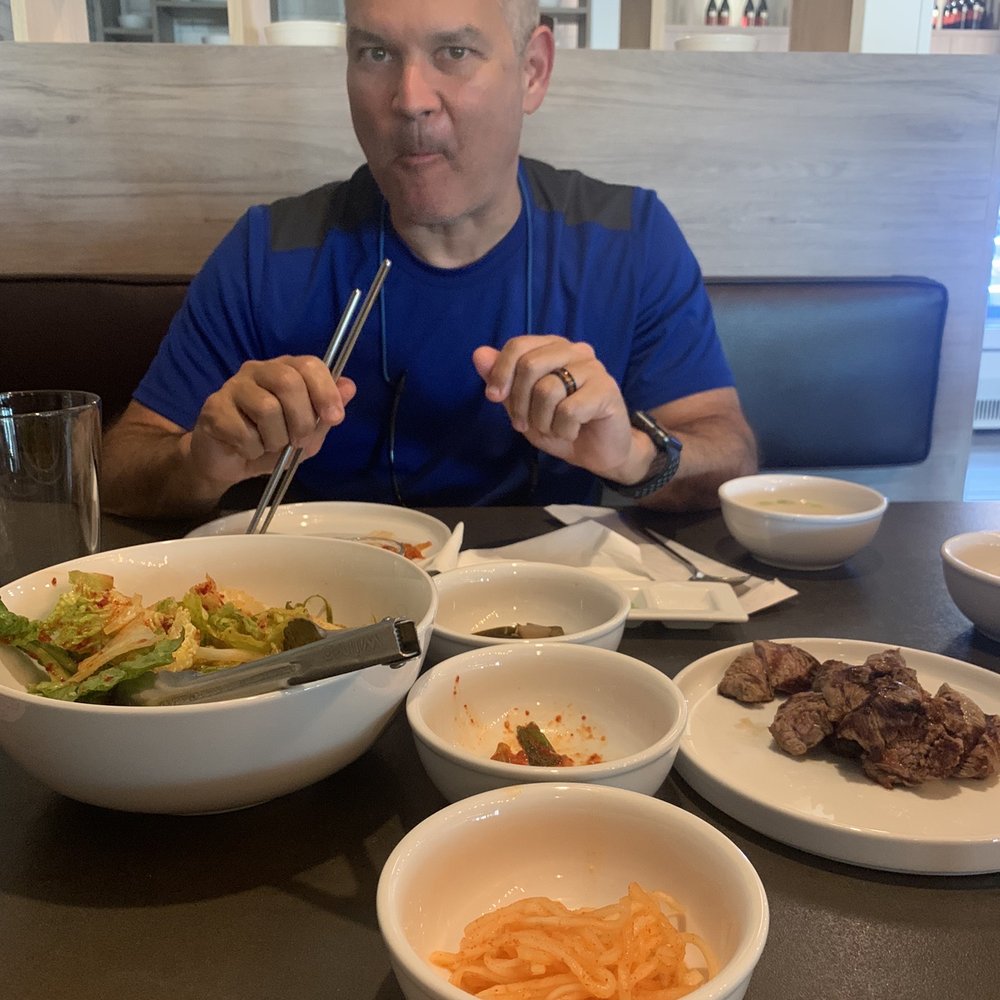 Korean Garden - Hubby enjoying the food (first meat is done) - Korean Near Me - Suwanee, Georgia Korean Garden - Hubby enjoying the food (first meat is done) - Korean Near Me - Suwanee, Georgia