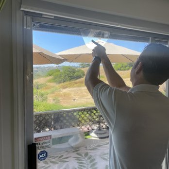 Advanced Solar Technologies - Scraping off the old tent, a very hard job - Home Window Tinting Near Me - San Diego, California