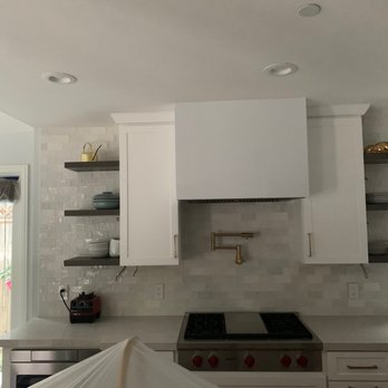 Keane Kitchens - a view of a kitchen with white cabinets - General Contractors Near Me - Belmont, California