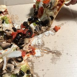 Pizza Hut - Pizza was extremely doughy and not good.