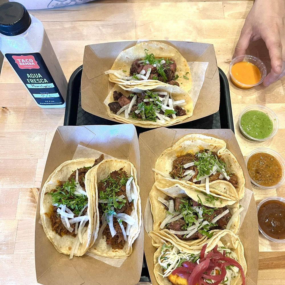 Taco Bamba Fairfax - Birria Taco (on the left), Pescado Taco (with the pink onions), Lengua de Res Taco (on the top) - Tacos Near Me - Fairfax, Virginia Taco Bamba Fairfax - Birria Taco (on the left), Pescado Taco (with the pink onions), Lengua de Res Taco (on the top) - Tacos Near Me - Fairfax, Virginia