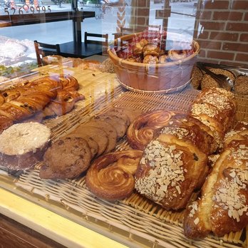 L'Artisan - a variety of pastries in a display case - Chocolatiers & Shops Near Me - Montreal, Quebec