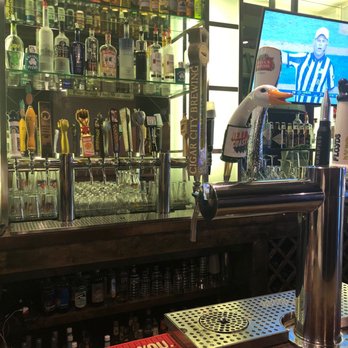 O'Rourkes Office - a man behind the bar - Bars Near Me - Chicago, Illinois