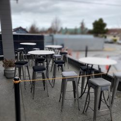 Peninsula Taproom - Dog friendly patio with plenty of seating.