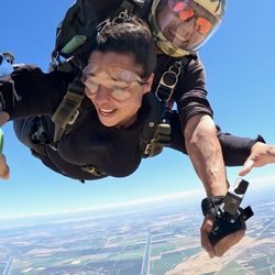 Bay Area Skydiving - I asked (motioned?) wild bill if we he could spin us. He grabbed my hand and let us fly!
