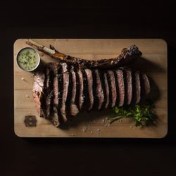 Repeal Oak Fired Steakhouse - Brush Creek Ranch Tomahawk Ribeye