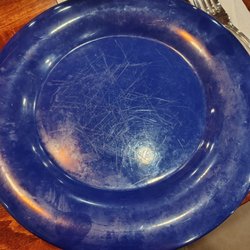 Plate with scoring, grease stains, finger prints
