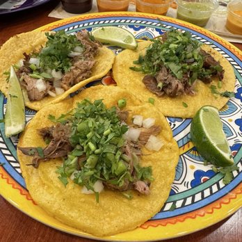 Uno Taqueria - Taco Carne Asada (3) , carnitas (3), and Mexican rice. With a variety of sauces on the side! - Mexican Near Me - Allentown, Pennsylvania