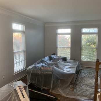 J Parral Contractor - a living room being painted - General Contractors Near Me